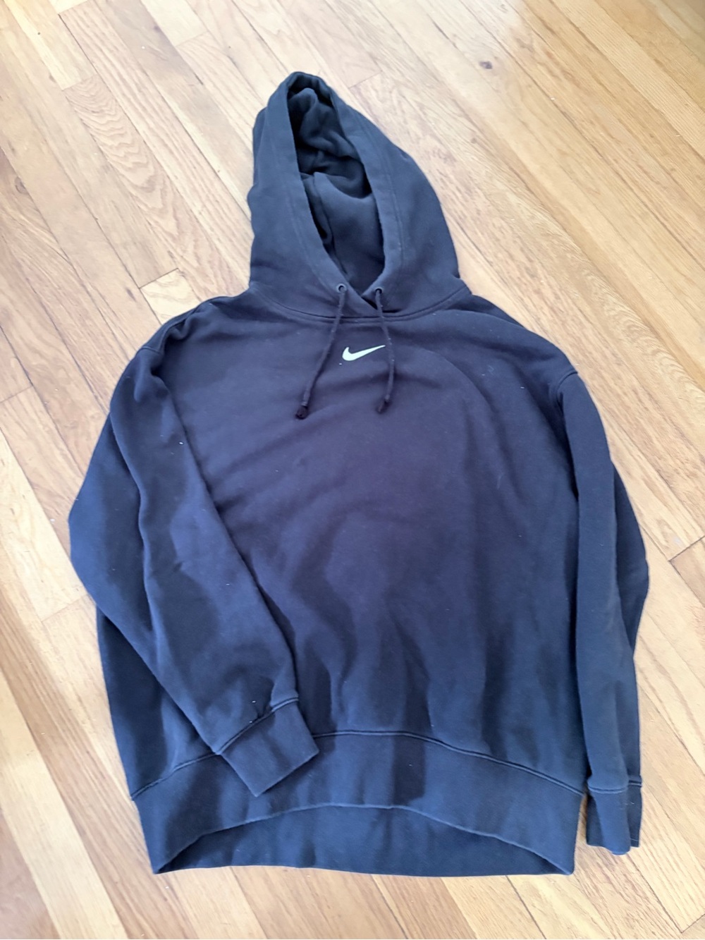 Nike Black Hoodie with White Swoosh Logo